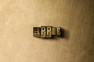 APPLE - close-up of grungy vintage typeset word on metal backdrop. Royalty free stock illustration.  Can be used for online banner ads and direct mail.