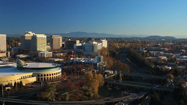 Portland Aerial v75 Flying low over Willamette River panning with Lloyd District views.
