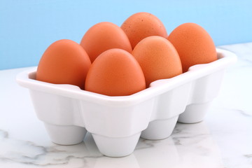 Fresh eggs on kitchen station