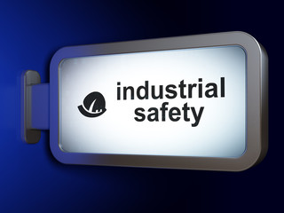 Construction concept: Industrial Safety and Safety Helmet on billboard background