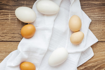 Chicken eggs on a white napkin