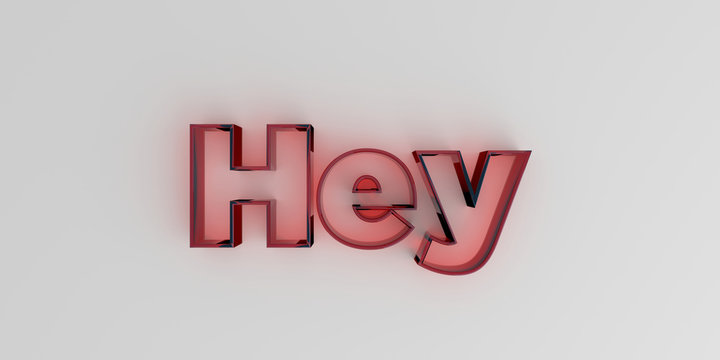 Hey - Red glass text on white background - 3D rendered royalty free stock image.
