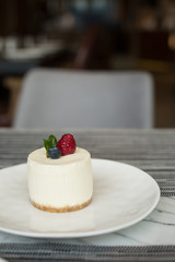 Salted Caramel Cheesecake Decorated with Berries