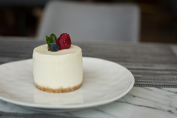 Salted Caramel Cheesecake Decorated with Berries