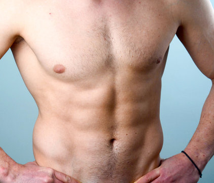 urecognizable young macho bodybuilder with sexy muscular body