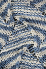 white and blue knit fabric