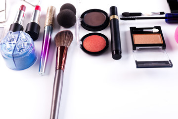 Makeup cosmetics tools and essentials, flat lay on white background