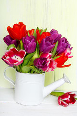 Tulip bouquet on  wooden background, copy space