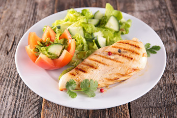 fried chicken breast with salad