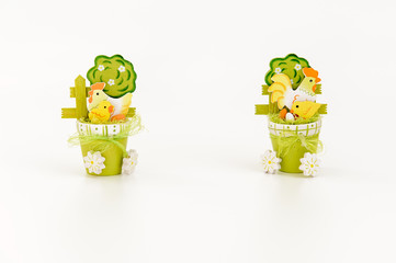 easter decoration with two cocks and two chicks, isolated on white background