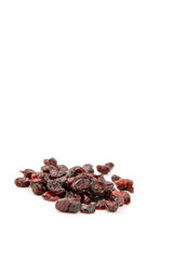 closeup of dried cranberries, isolated on white background, vertical