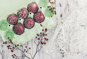 Decorated Easter eggs Pysanka on whitewashed wooden background © ansyvan