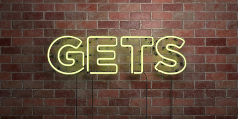 GETS - fluorescent Neon tube Sign on brickwork - Front view - 3D rendered royalty free stock picture. Can be used for online banner ads and direct mailers..