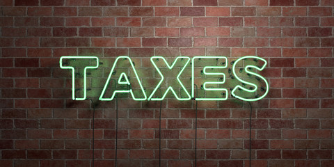 TAXES - fluorescent Neon tube Sign on brickwork - Front view - 3D rendered royalty free stock picture. Can be used for online banner ads and direct mailers..