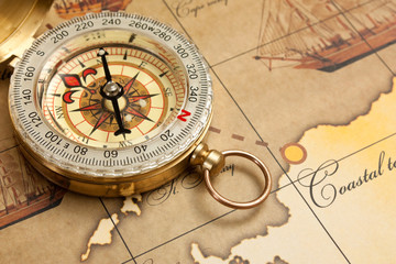 Fototapeta na wymiar compass on map