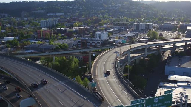 Portland Aerial v93 Flying low over I-405 Fremont Bridge traffic panning.