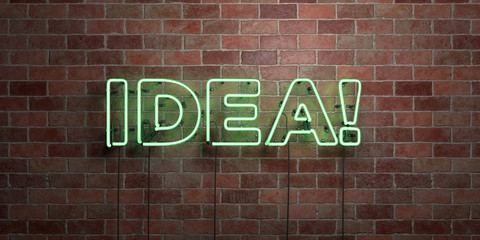 Obraz premium IDEA! - fluorescent Neon tube Sign on brickwork - Front view - 3D rendered royalty free stock picture. Can be used for online banner ads and direct mailers..