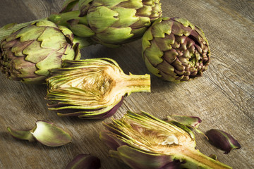 artichokes sliced on wooden background