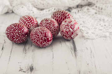Decorated Easter eggs Pysanka on whitewashed wooden background © ansyvan
