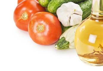 vegetables and a bottle of oil, still life  isolated