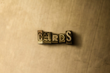 CARDS - close-up of grungy vintage typeset word on metal backdrop. Royalty free stock illustration.  Can be used for online banner ads and direct mail.