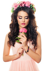 Naklejka premium Cute Girl with Peony Flower on White