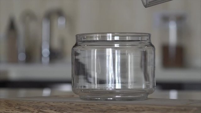 Walnut in glass sift pour forth