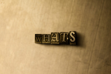 WHATS - close-up of grungy vintage typeset word on metal backdrop. Royalty free stock illustration.  Can be used for online banner ads and direct mail.