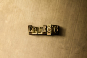 EFFECT - close-up of grungy vintage typeset word on metal backdrop. Royalty free stock illustration.  Can be used for online banner ads and direct mail.