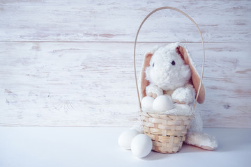 bunny with basket and eggs