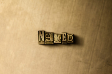 NAKED - close-up of grungy vintage typeset word on metal backdrop. Royalty free stock illustration.  Can be used for online banner ads and direct mail.