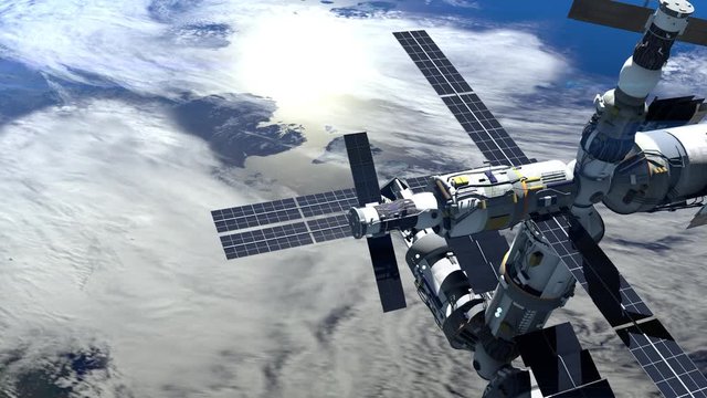 Flight Of The Space Station Above The Earth. The static camera. International space station is orbiting the Earth. ISS. 4K.