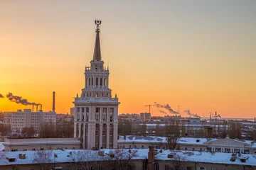 Deurstickers Evening Voronezh, tower in architecture Stalinist empire on background of crimson sunset © Mulderphoto