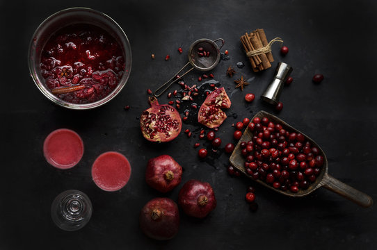 Overhead view of ingredients for pomegranate and cranberry gin 