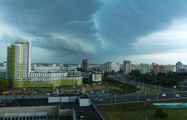 Thunderstorm in the city, the city of Minsk, Belarus, July, summer, day, construction of residential houses, overpass,