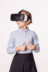 schoolgirl with virtual reality headset. Innovation technology and education concept