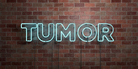 TUMOR - fluorescent Neon tube Sign on brickwork - Front view - 3D rendered royalty free stock picture. Can be used for online banner ads and direct mailers..