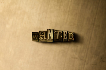 WANTED - close-up of grungy vintage typeset word on metal backdrop. Royalty free stock illustration.  Can be used for online banner ads and direct mail.