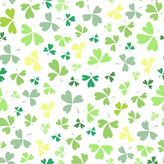 Abstract doodle seamless St Patrick's day background decorated with shamrock leaves. Wrapping paper design, banner