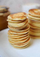Pancakes on a white plate closeup