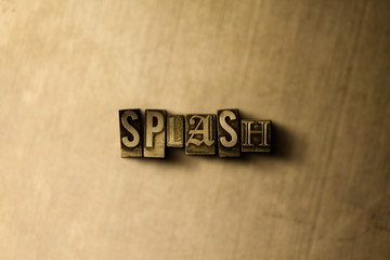 SPLASH - close-up of grungy vintage typeset word on metal backdrop. Royalty free stock illustration.  Can be used for online banner ads and direct mail.