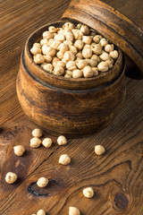 Portion of Chick Peas in wooden bowl