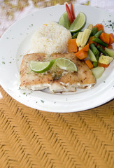 fresh fish fillet with garlic lime rice Central American vegetables as photographed in Big Corn Island Nicaragua