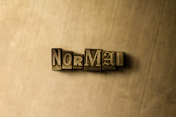 NORMAL - close-up of grungy vintage typeset word on metal backdrop. Royalty free stock illustration.  Can be used for online banner ads and direct mail.
