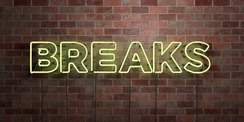 BREAKS - fluorescent Neon tube Sign on brickwork - Front view - 3D rendered royalty free stock picture. Can be used for online banner ads and direct mailers..