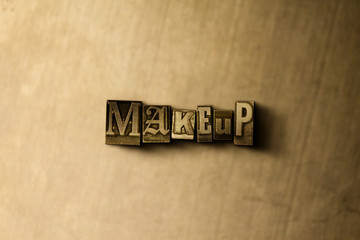 MAKEUP - close-up of grungy vintage typeset word on metal backdrop. Royalty free stock illustration.  Can be used for online banner ads and direct mail.