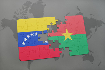 puzzle with the national flag of venezuela and burkina faso on a world map