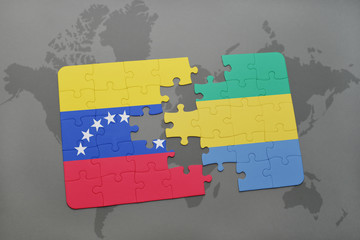 puzzle with the national flag of venezuela and gabon on a world map