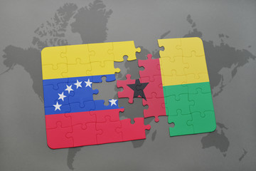 puzzle with the national flag of venezuela and guinea bissau on a world map