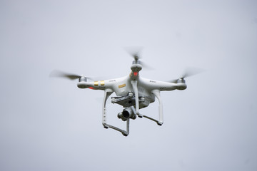 Fototapeta na wymiar Flying DJI Drone in the sky